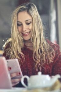 Girl with laptop and cell